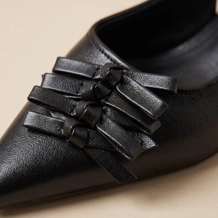 Stylish pointed toe slingback kitten heels for women, ideal elegant footwear for office or evening.