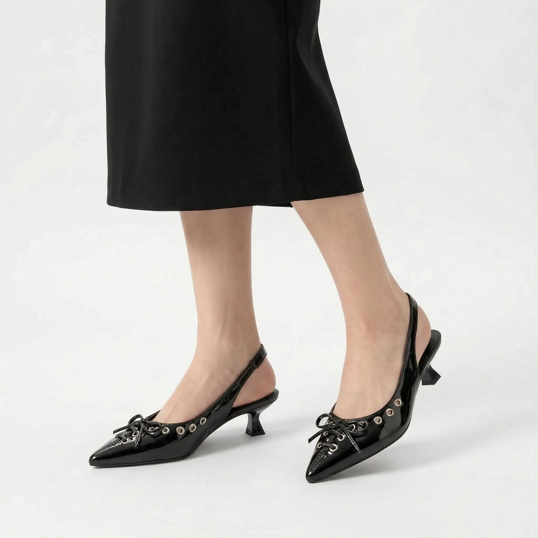 Sophisticated women's pointed toe slingback kitten heels, comfortable and chic for day-to-night styling.