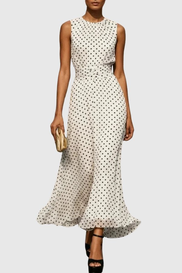 Elegant women's polka dot maxi dress with ruffle hem. Perfect for evening events, parties, and formal occasions.