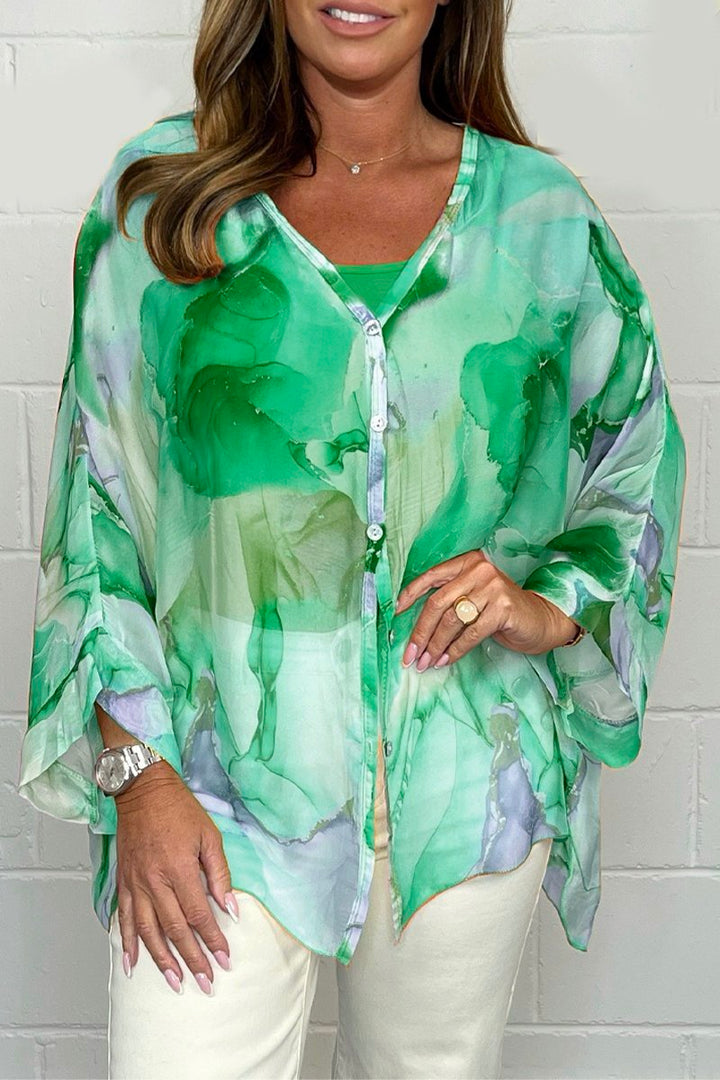 Chic printed top for women, ideal for spring & summer fashion. A comfortable, elegant, and versatile shirt.