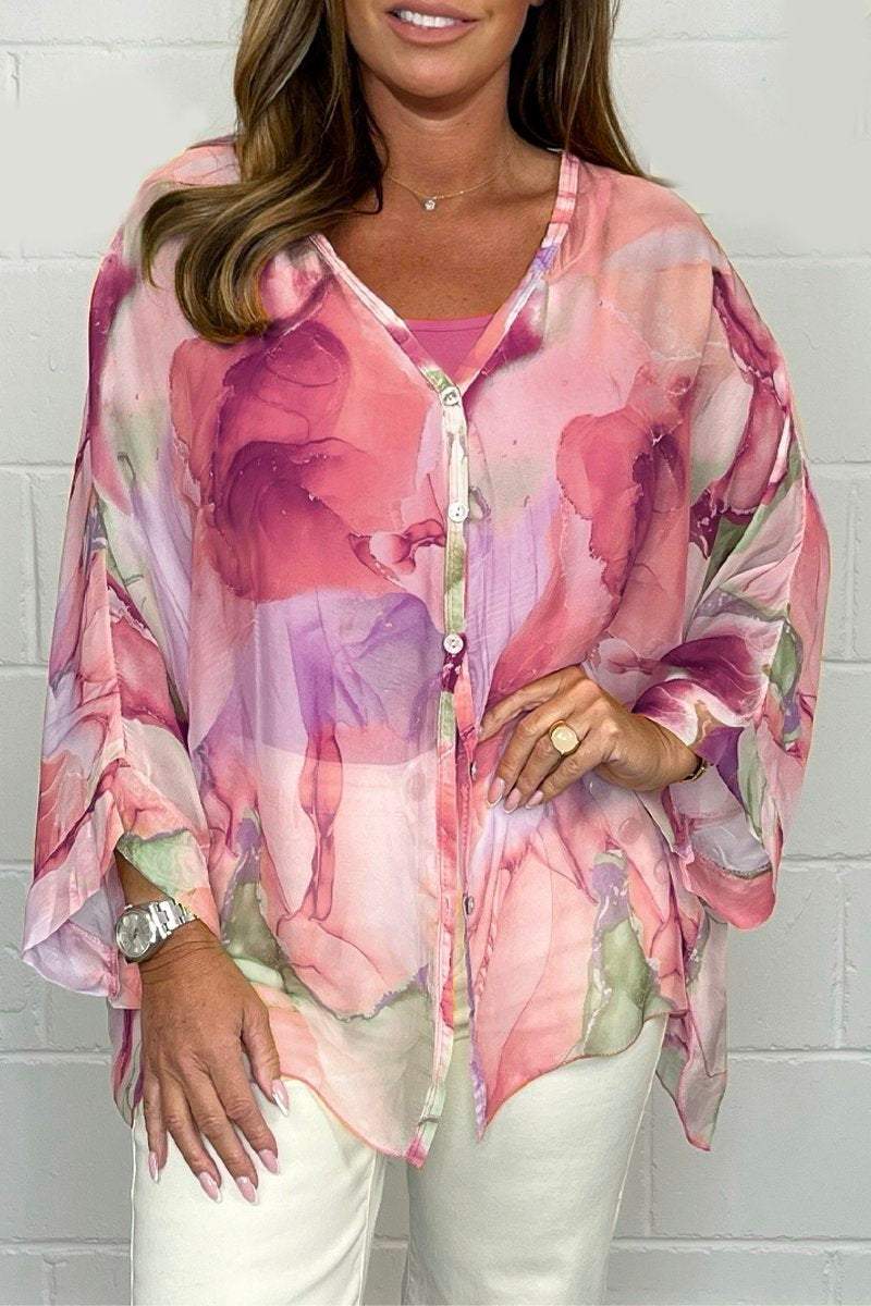 Plus size women's elegant printed blouse for spring/summer. A versatile & comfortable casual top.