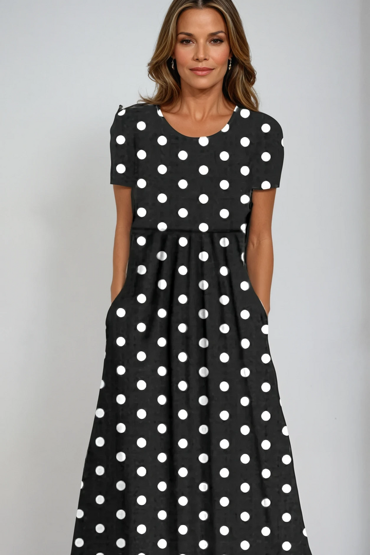 Elegant women's printed maxi dress, perfect for evening wear or special occasions. Flowing & flattering fit.