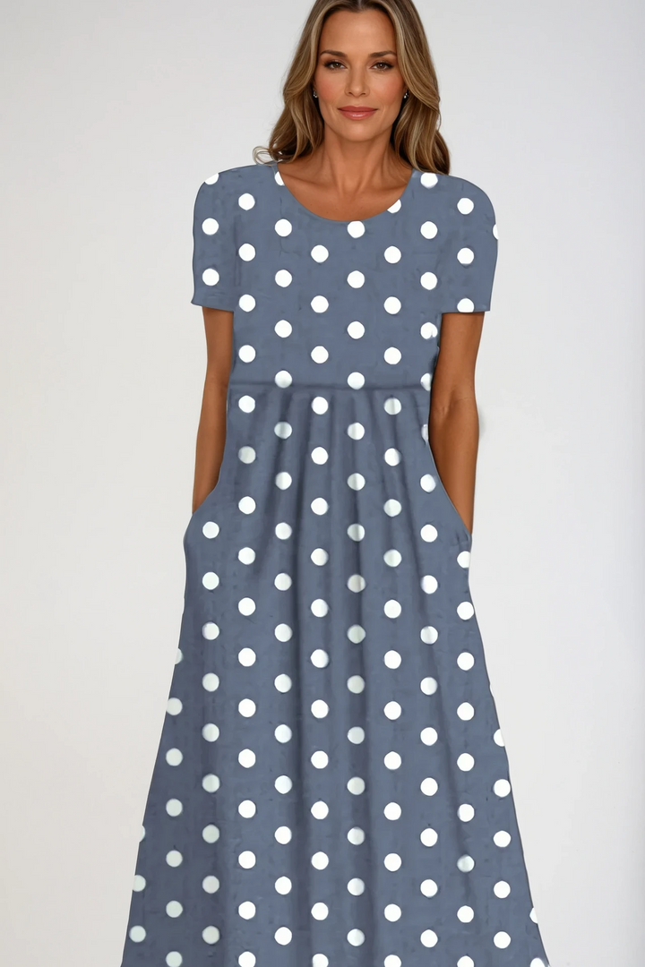 Flattering women's printed maxi dress, stylish & comfortable for parties or formal events. Long, feminine design.