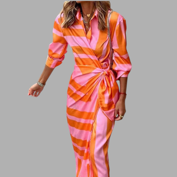 Elegant women's printed midi dress, perfect for semi-formal events or spring parties. Graceful and flattering design.