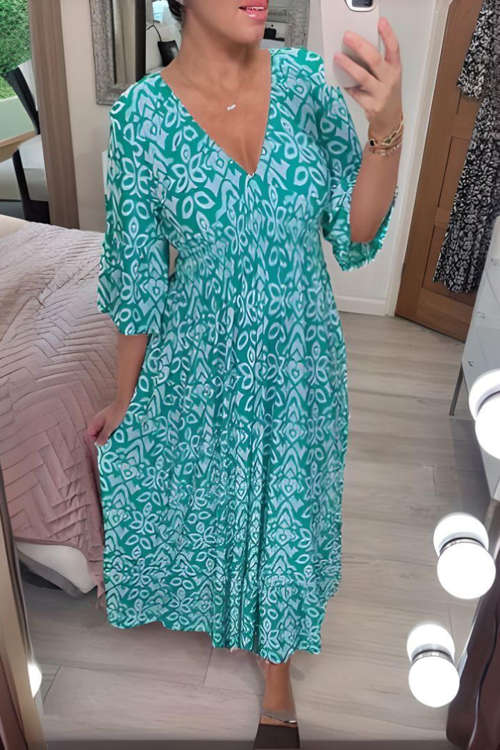 Chic women's printed midi dress with a belted waist, an elegant choice for spring events and gatherings.