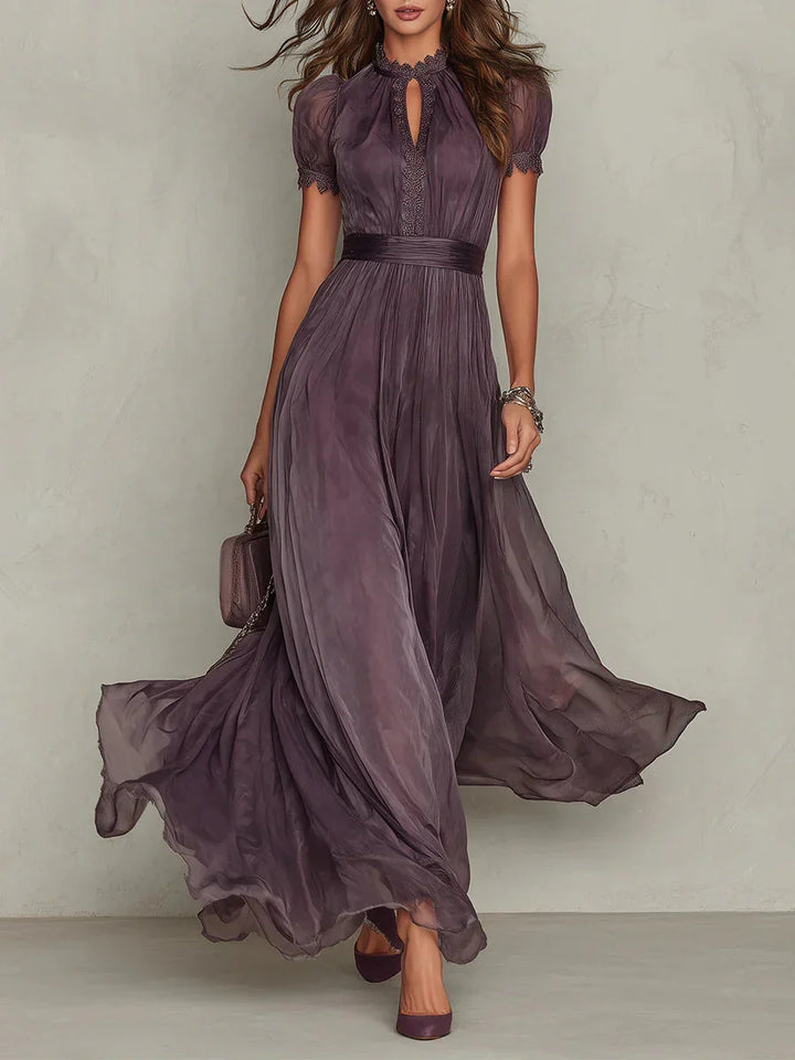 Women's formal pleated floral maxi dress with long sleeves in purple, ideal as an elegant evening gown.