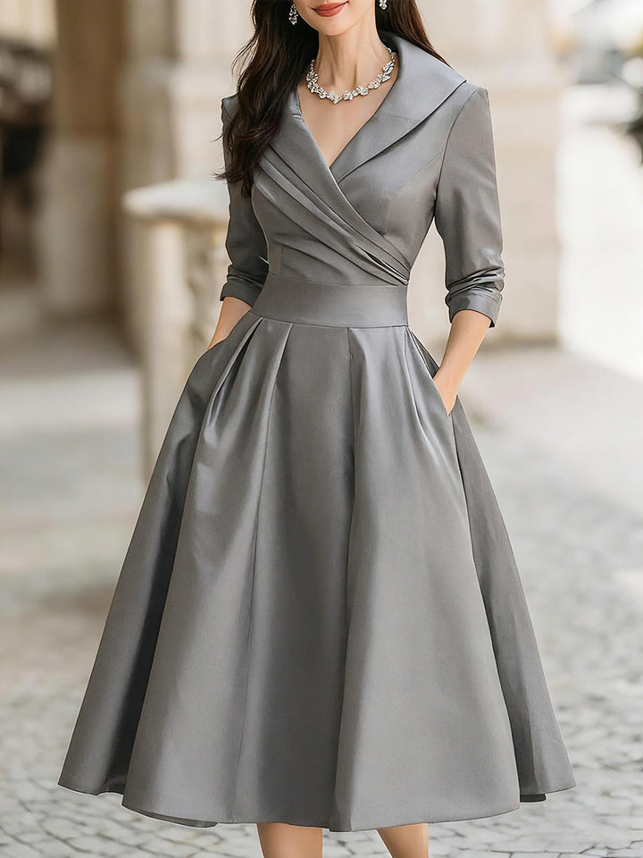 Formal women's long sleeve midi dress in a retro style with an elegant draped collar, perfect for special events.