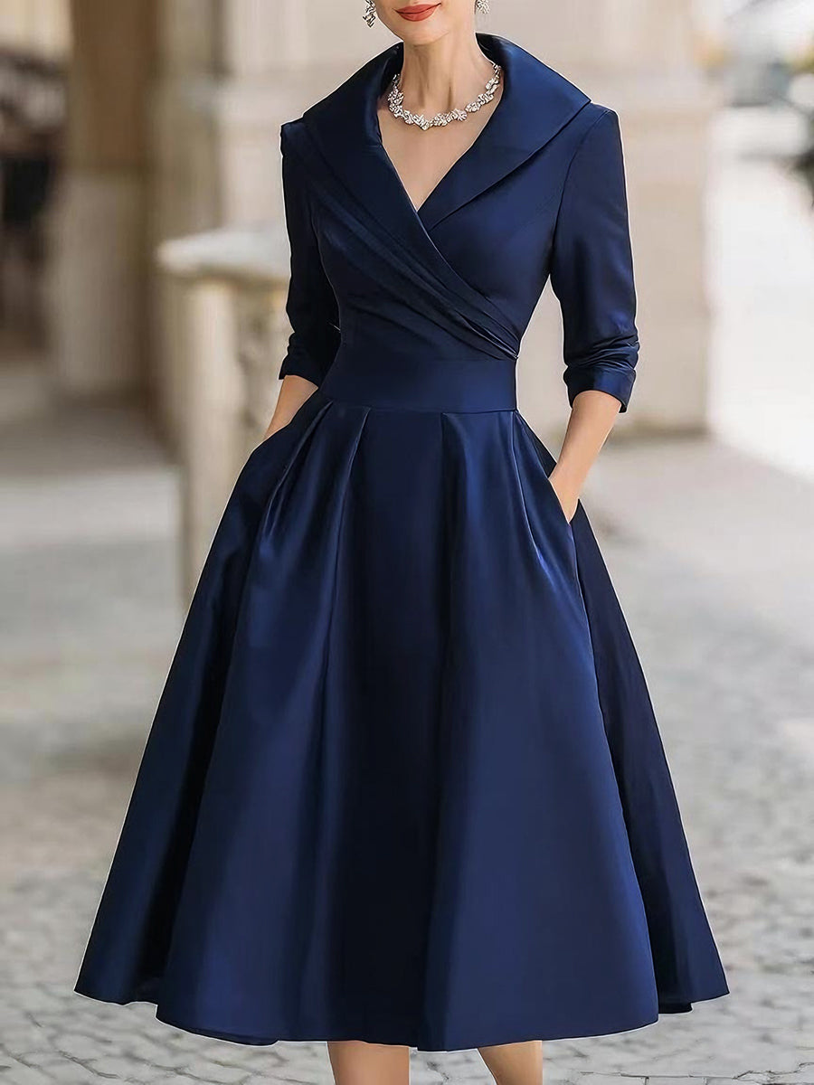 Vintage-inspired women's retro midi dress. Elegant draped collar and long sleeves for a timeless formal look.