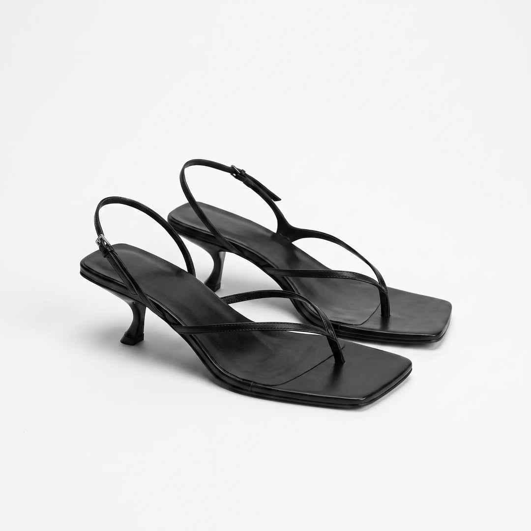 Women's retro style square toe kitten heel sandals. Comfortable and chic summer footwear with adjustable strap.