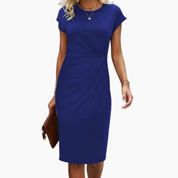 Chic women's short sleeve midi dress with a flattering round neck, offering elegant style for daily or office wear.