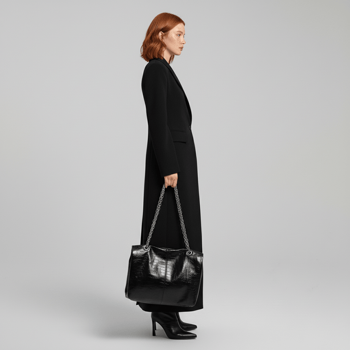 Sophisticated women's ruby tailored longline coat, a classic fitted design ideal for elegant evening and fall fashion.