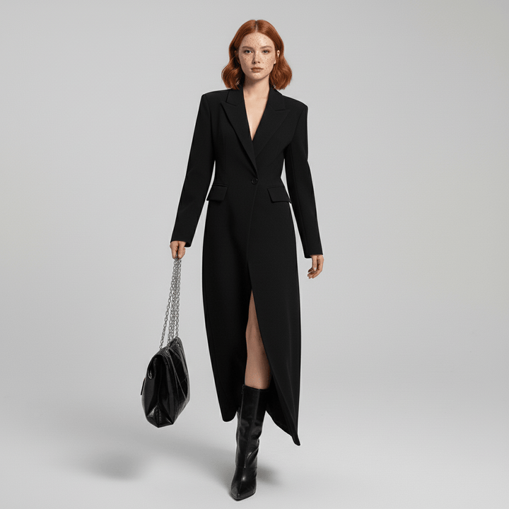 Warm ruby red women's long fitted winter coat, offering a structured and tailored look for cold weather elegance.