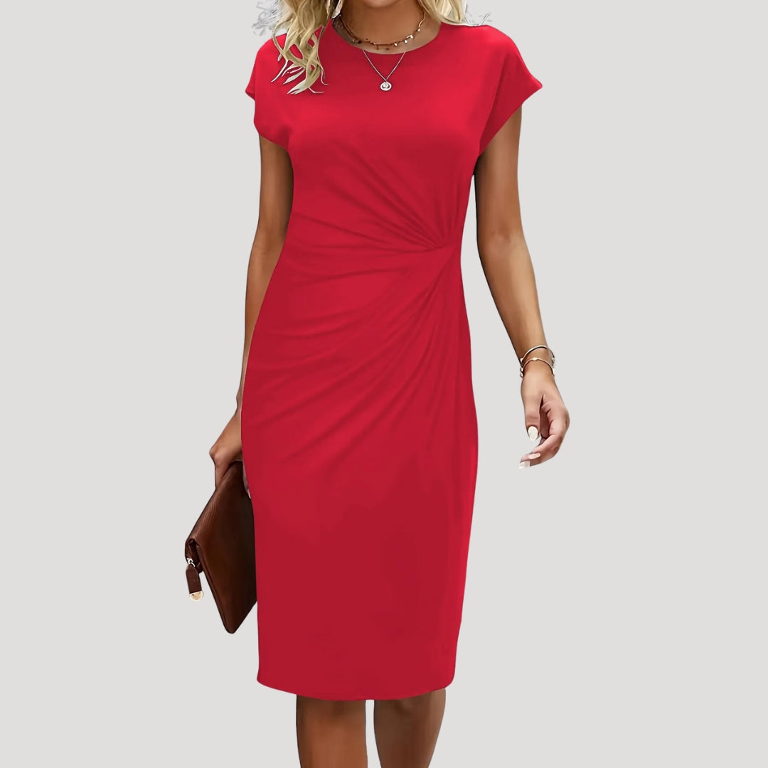 Chic women's cap sleeve midi dress, featuring elegant ruched details & a flattering fitted silhouette.