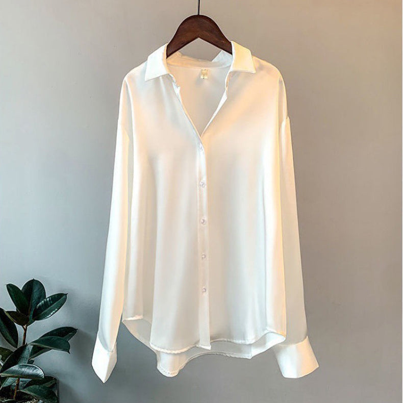 Elegant women's ruffle blouse with long sleeves, perfect for chic and versatile fashion outfits.