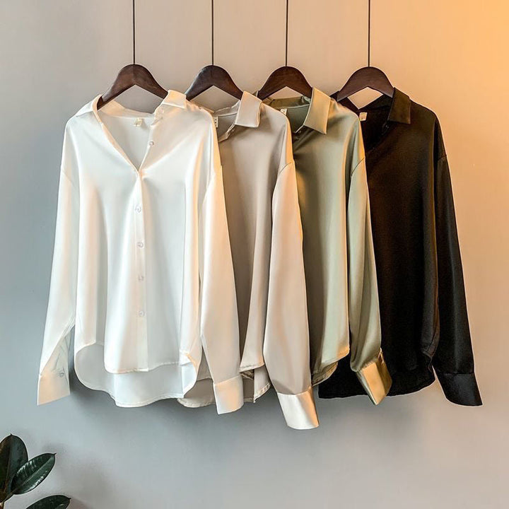 Versatile women's elegant ruffle blouse with long sleeves, a stylish top for any occasion.