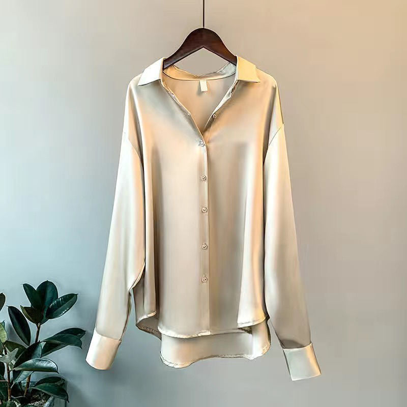 Model wearing a stylish women's long sleeve ruffle blouse, showcasing its elegant and versatile design.