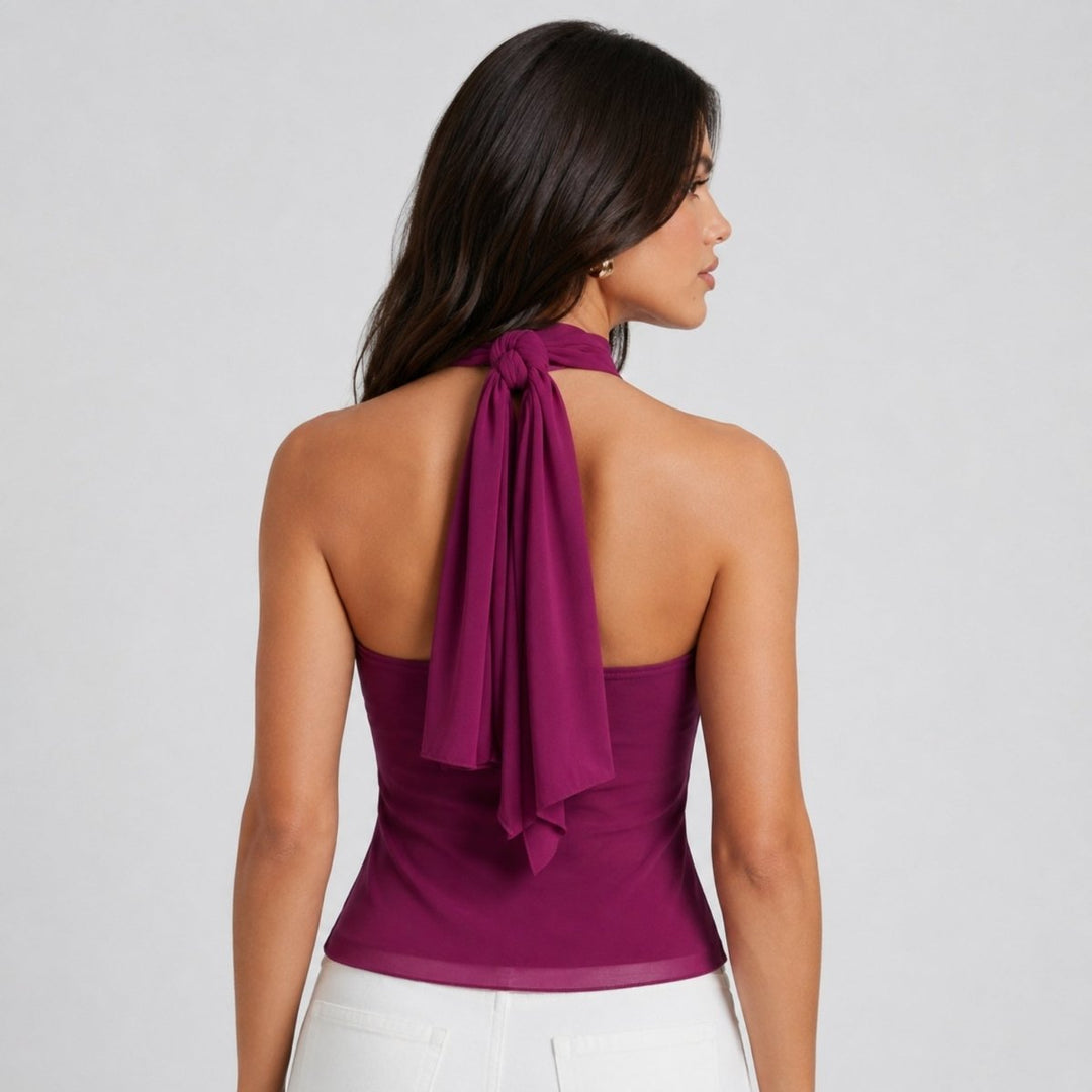 Stylish women's mock neck ruffle halter top with tie back, perfect evening blouse.