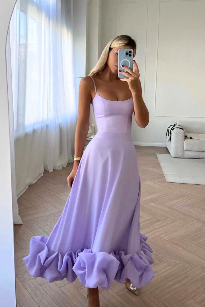 Stylish women's occasionwear maxi dress with ruffle hem. Perfect elegant gown for formal events.