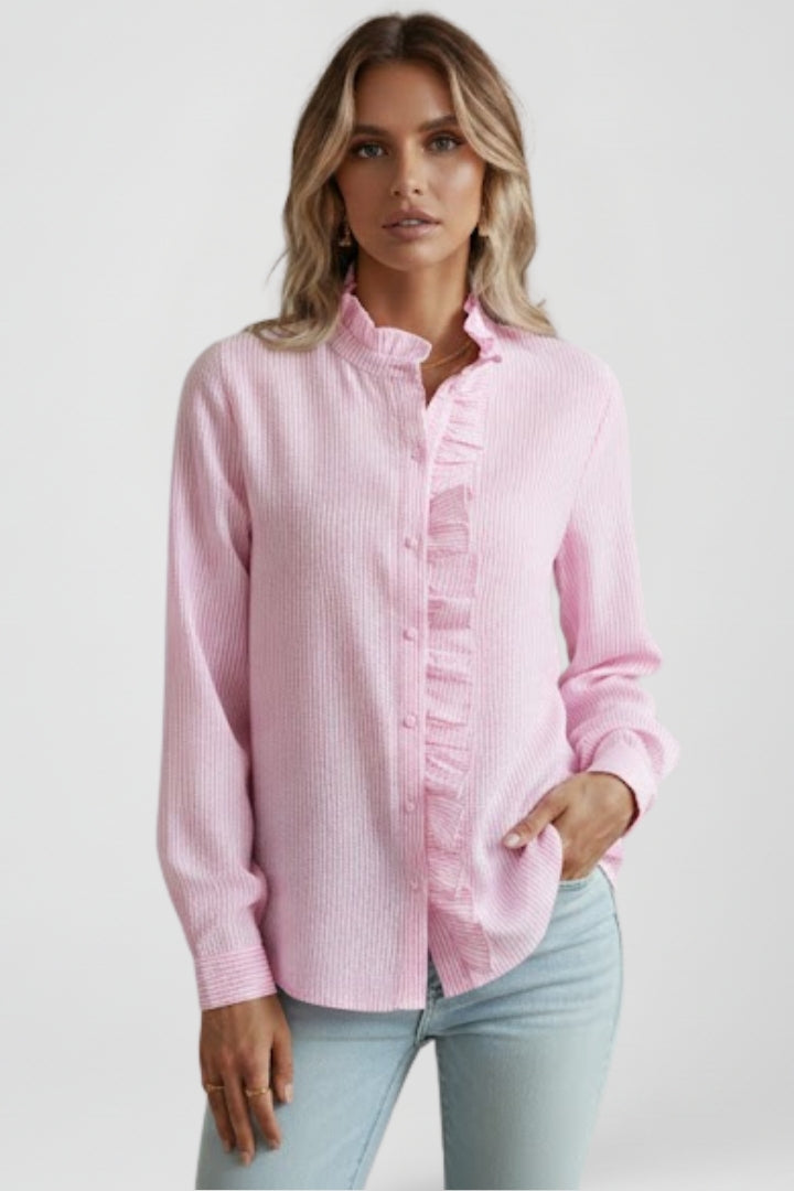 Chic women's button-front blouse featuring elegant ruffles and long sleeves, a versatile work or casual top.