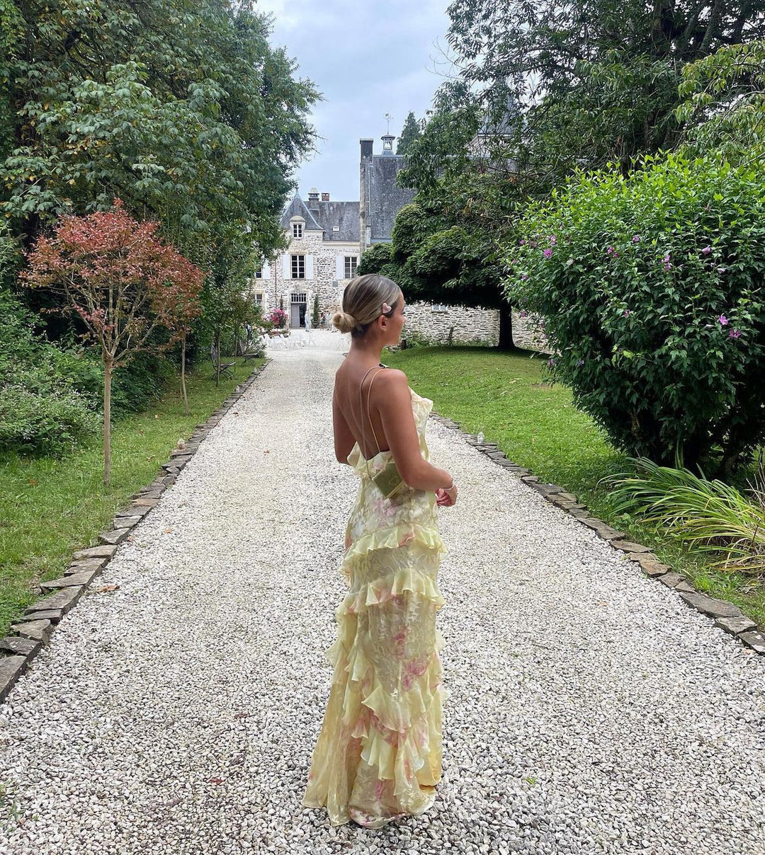 Stylish women's open-back ruffle maxi dress, ideal for summer parties, evening events, & special occasions.