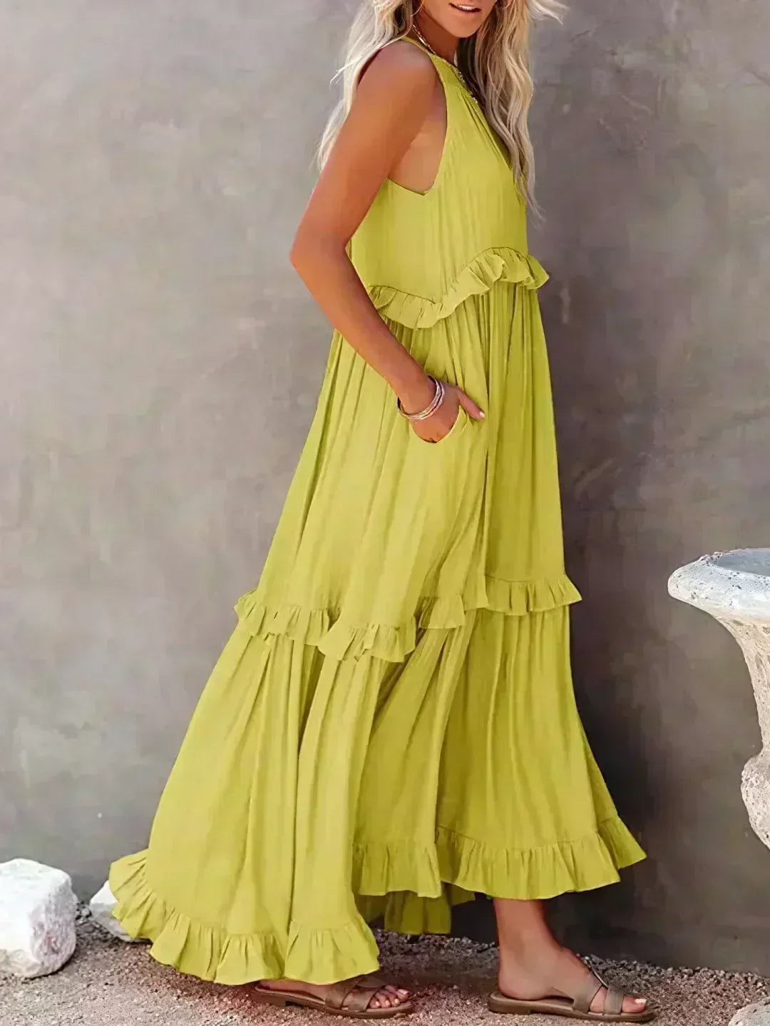 Stunning women's sleeveless midi dress with a comfortable flowy design and elegant ruffle accents.
