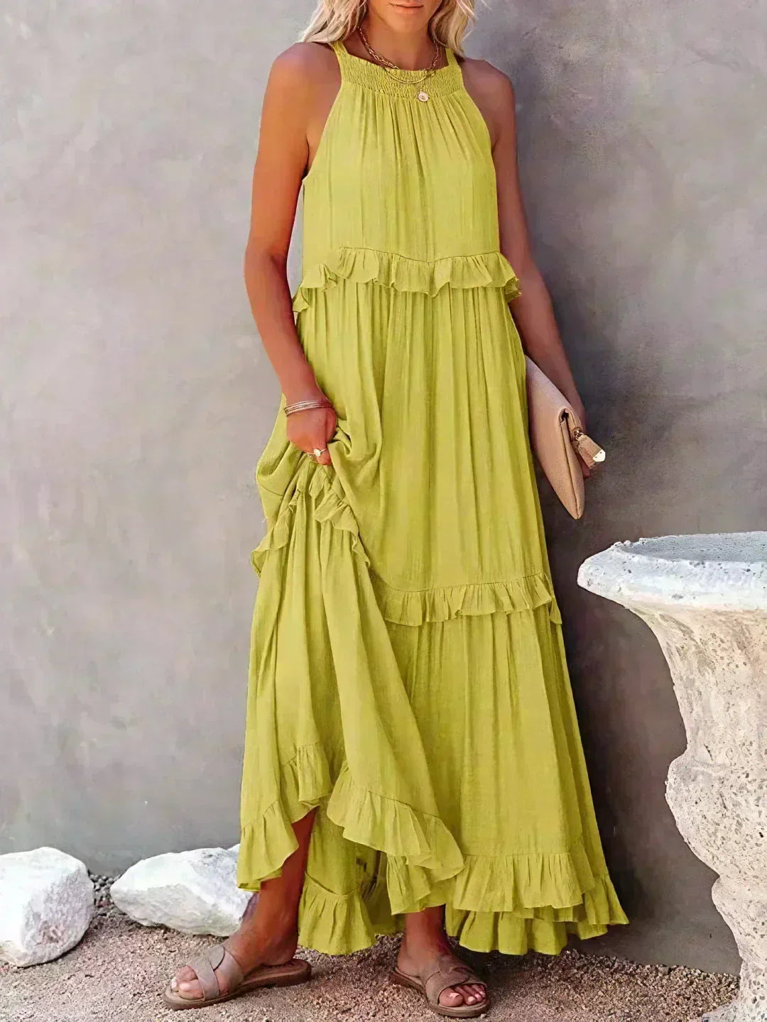 Chic women's ruffled midi dress; sleeveless, flowy, perfect for elegant casual occasions.