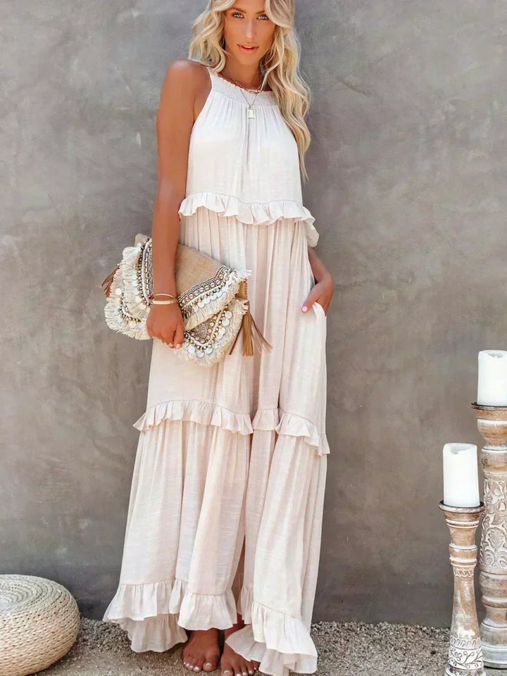 Sophisticated women's flowy sleeveless midi dress, featuring charming ruffles for a feminine look.