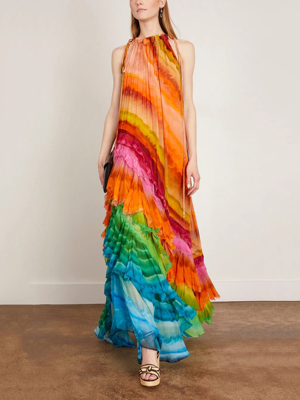 Chic women's tiered ruffled halter maxi dress, an elegant and flowy sleeveless gown for formal events.