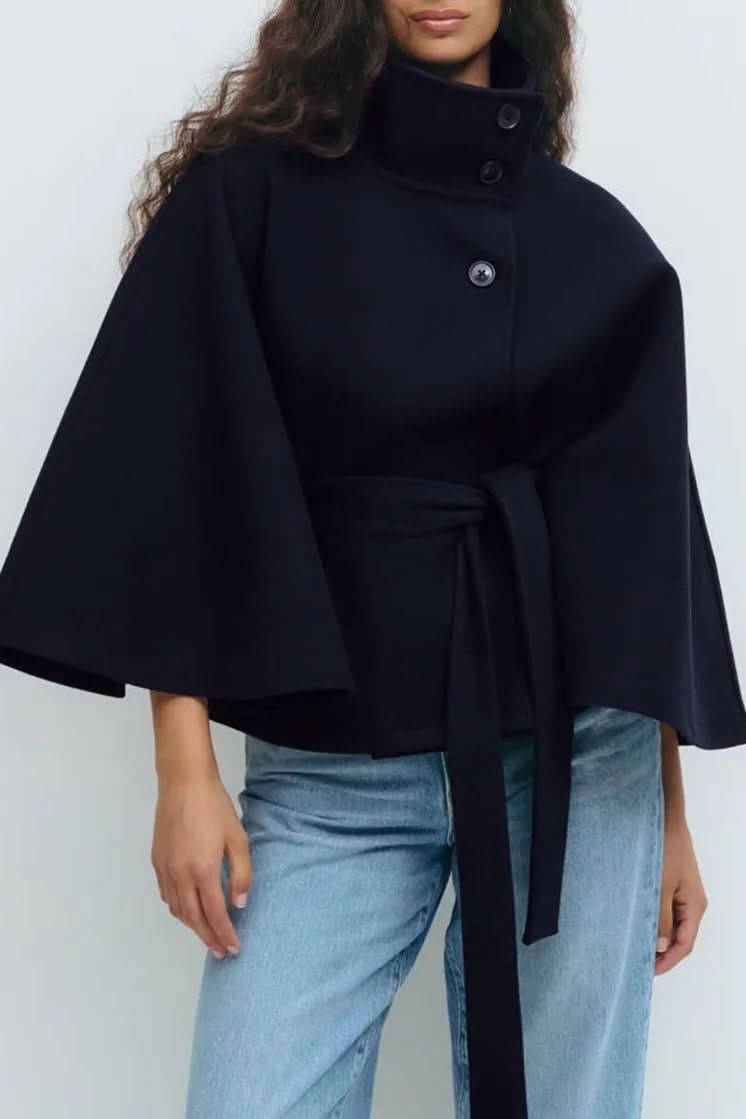 Stylish women's self-tie cape, elegant and oversized. Perfect modern outerwear for versatile fashion.