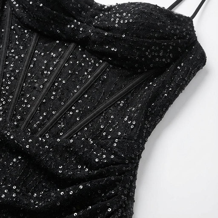 Women's shimmering sequin maxi dress, elegant strapless design, sweetheart neckline, and daring high slit.