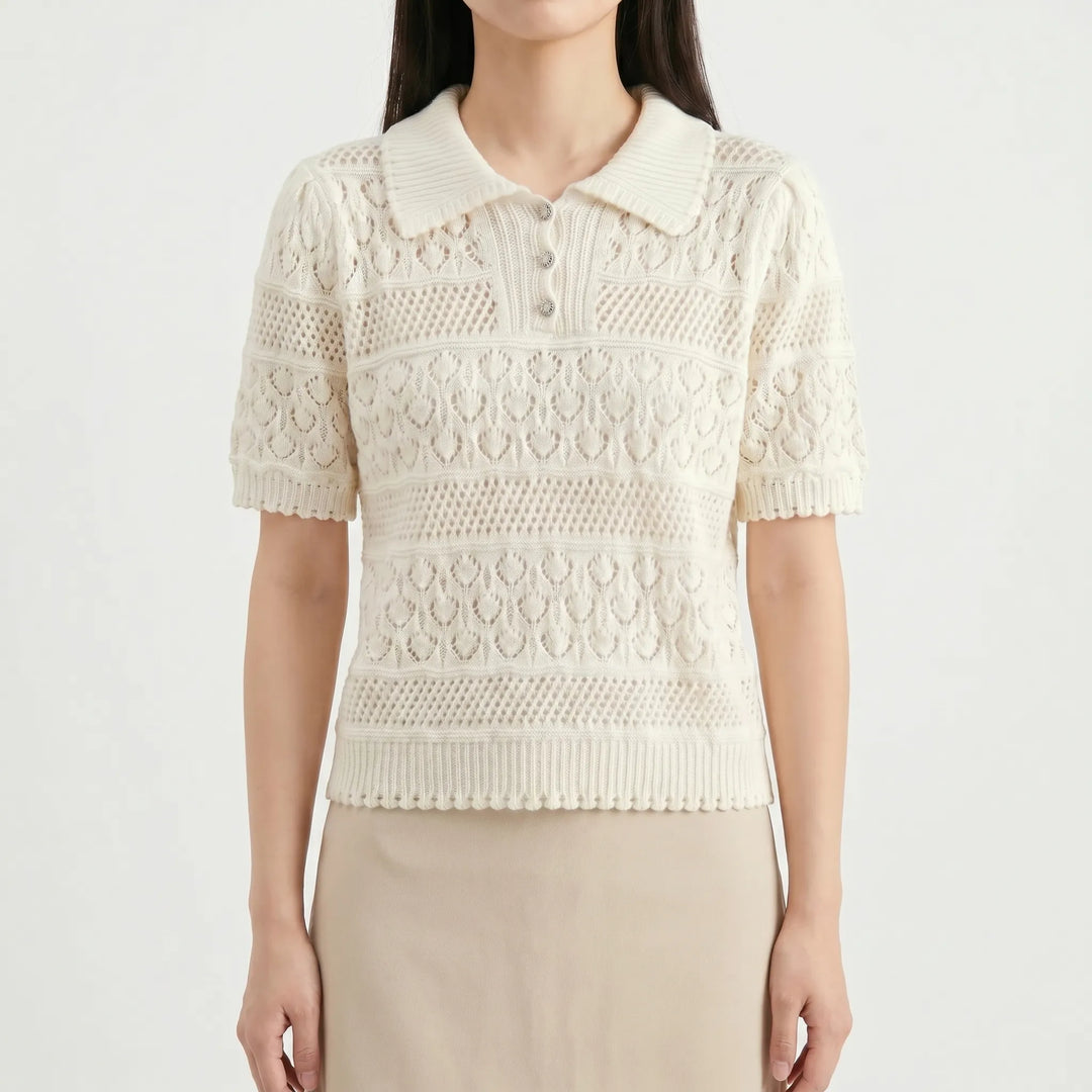Soft women's knit short-sleeve blouse with a classic polo collar, offering breathable comfort & style.