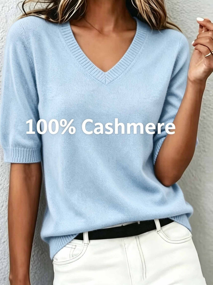 Women's elegant V-neck short-sleeve sweater, designed with a sophisticated ribbed collar for a polished look.