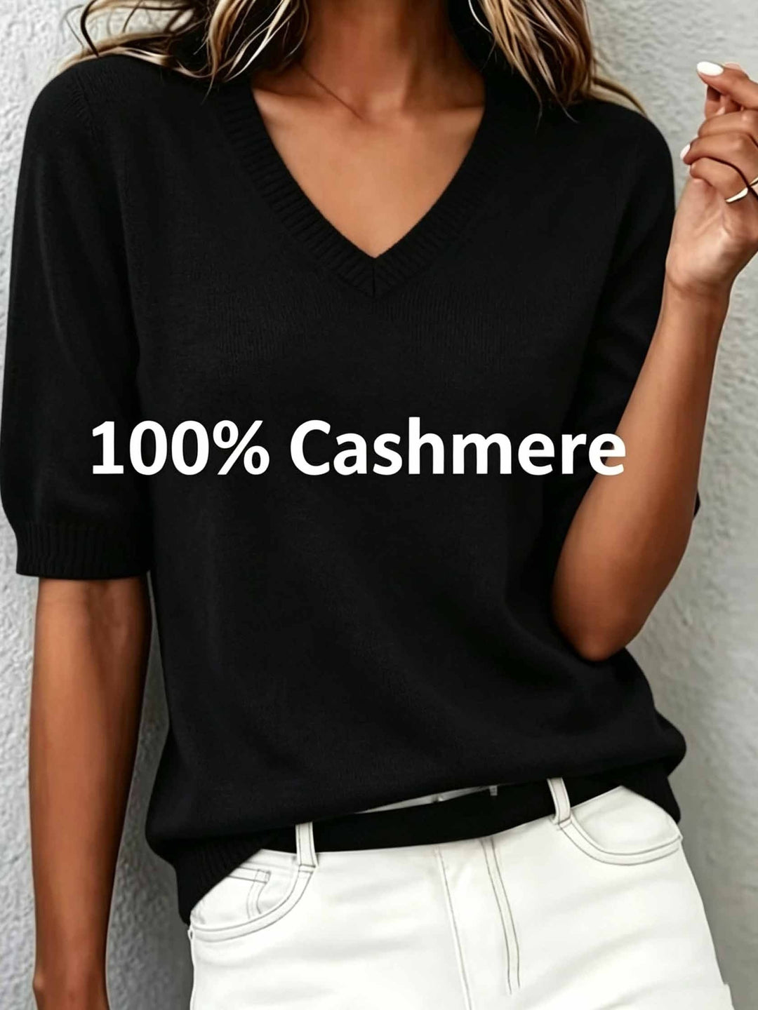Transitional women's short-sleeve V-neck sweater, an elegant top with ribbed collar for stylish spring or fall wear.
