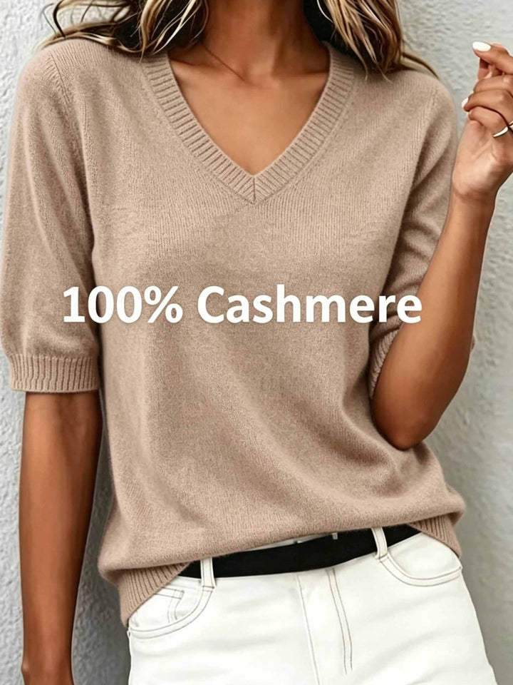Sophisticated women's V-neck short-sleeve sweater; elegant, comfortable, and features a classic ribbed collar.