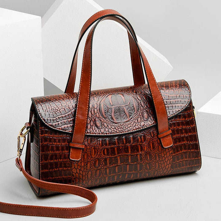 Versatile crocodile print women's shoulder bag. Embossed leather, designer quality, ideal everyday fashion accessory.