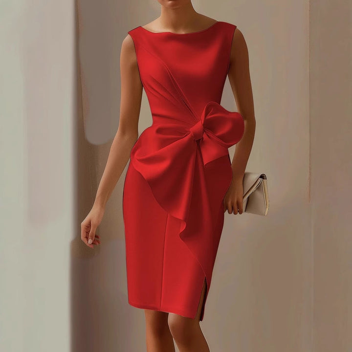 Stylish women's party dress. This elegant sleeveless design showcases a modern asymmetric cut & a charming bow accent.