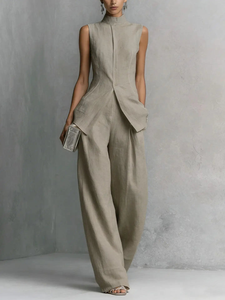 Sophisticated sleeveless high neck wide leg jumpsuit for women, versatile for spring, summer, office or party.