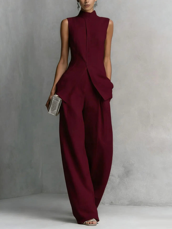 Chic women's high neck sleeveless jumpsuit with wide leg design, ideal for an elegant spring or summer look.