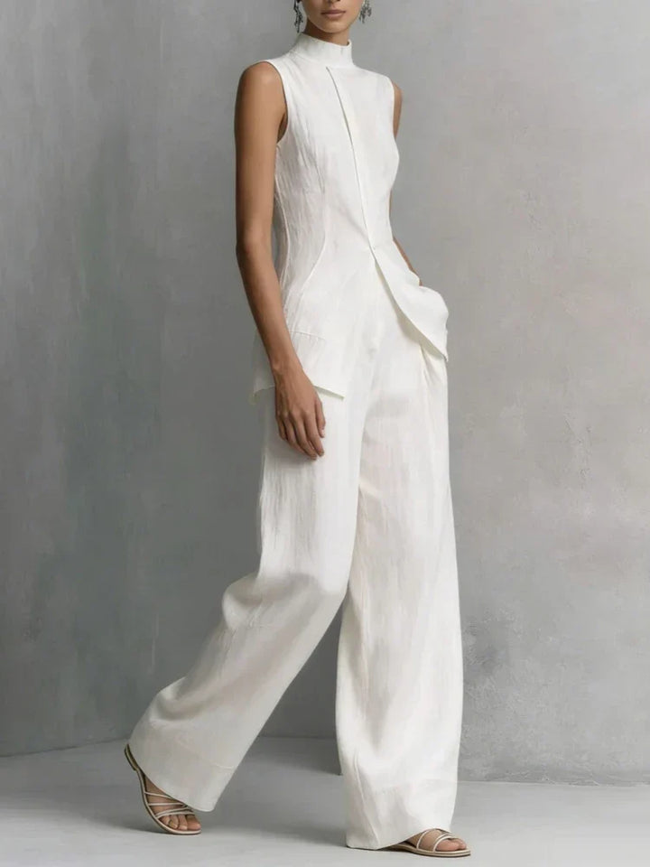Sleek women's sleeveless high neck wide leg jumpsuit, offering a comfortable and stylish one-piece formal wear.