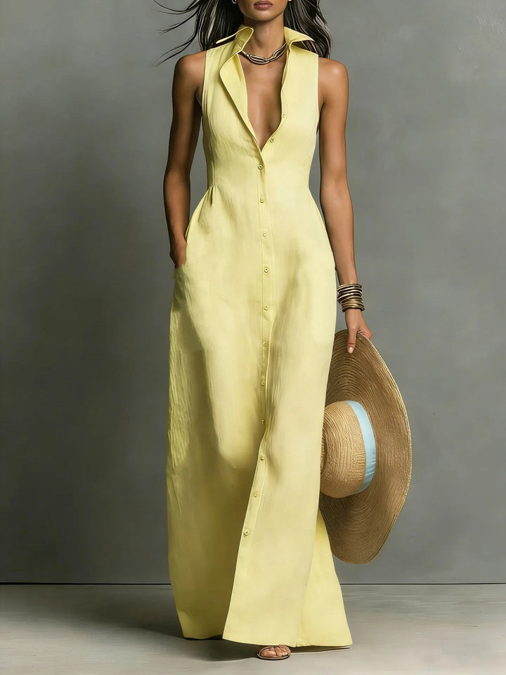 Stylish women's maxi dress featuring a button-front, lapel collar & sleeveless design for effortless elegance.