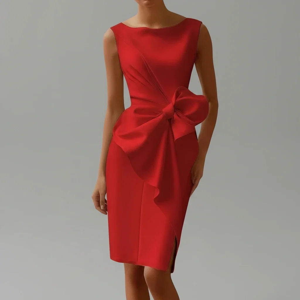 Stylish women's midi occasion wear dress with a prominent bow detail, suitable for evening events and formal gatherings.