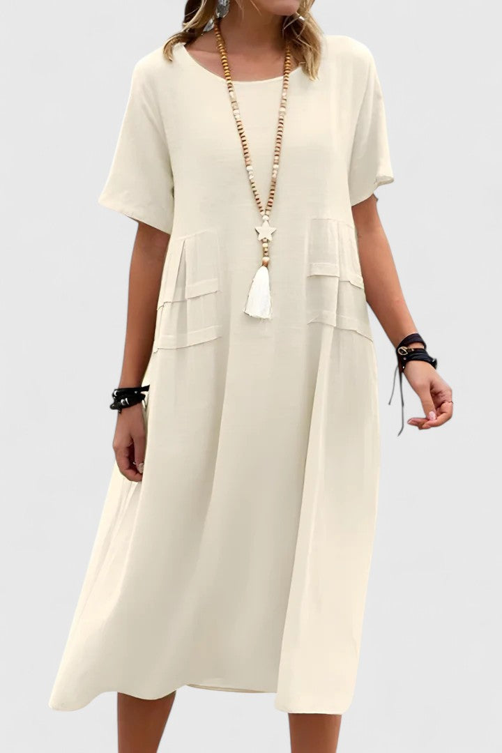 Elegant women's sleeveless midi dress, perfect for versatile wear from daytime casual to formal events.
