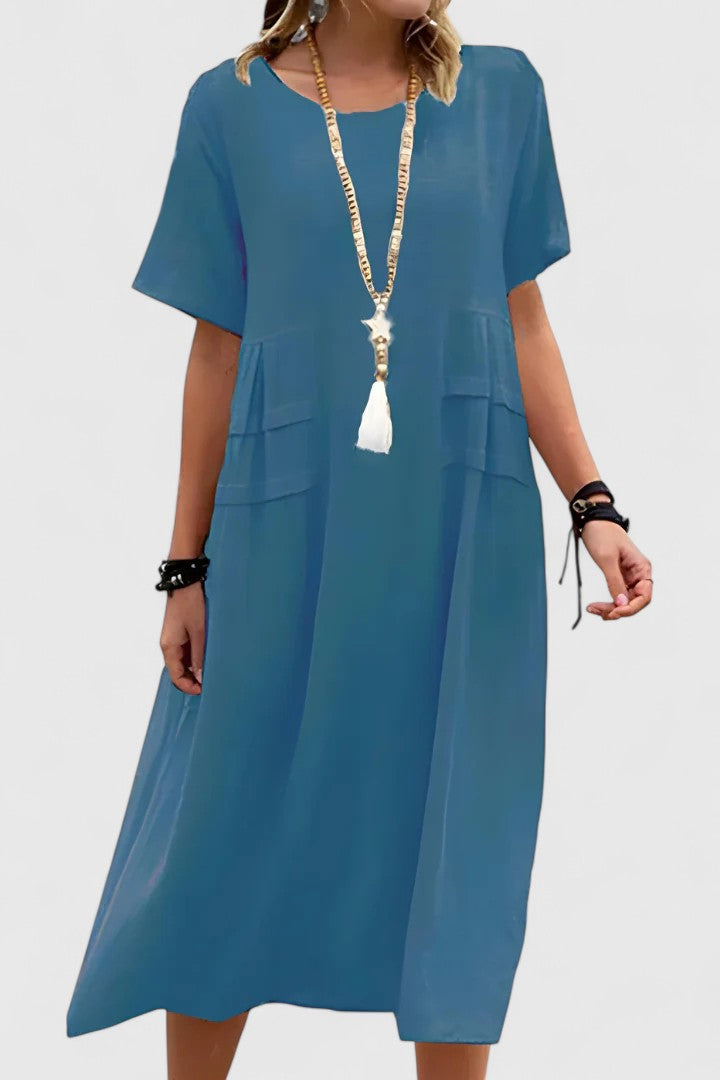 Versatile women's elegant midi dress in a classic cut, suitable for formal wear, parties, or chic casual outings.