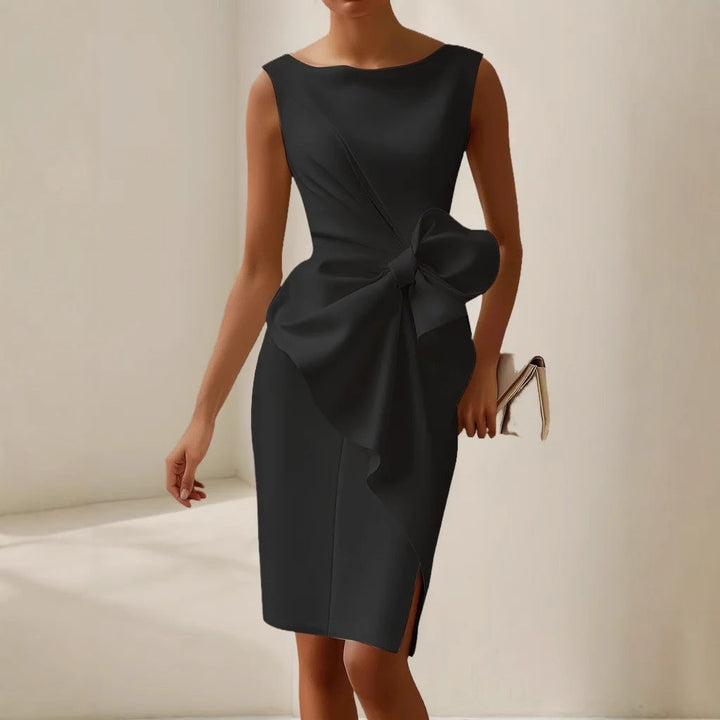 Women's sleeveless cocktail mini dress with an elegant waist tie, designed for a tailored fit.