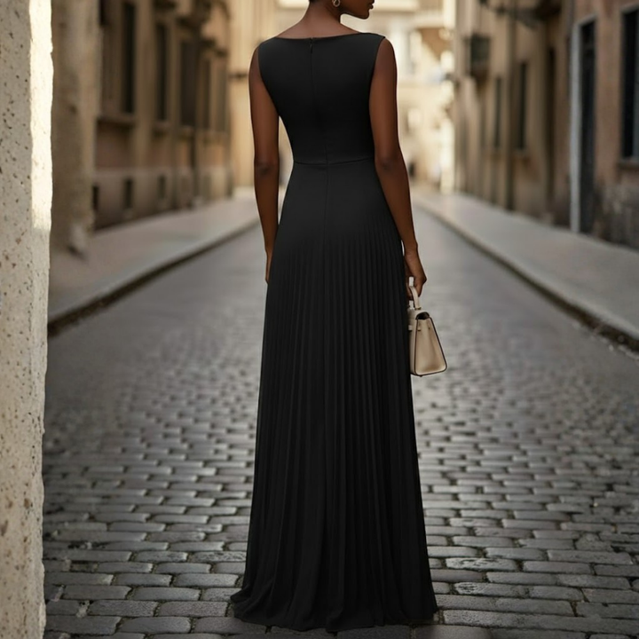 Graceful women's summer maxi dress, sleeveless with a boat neck and delicate pleats, perfect for elegant events.