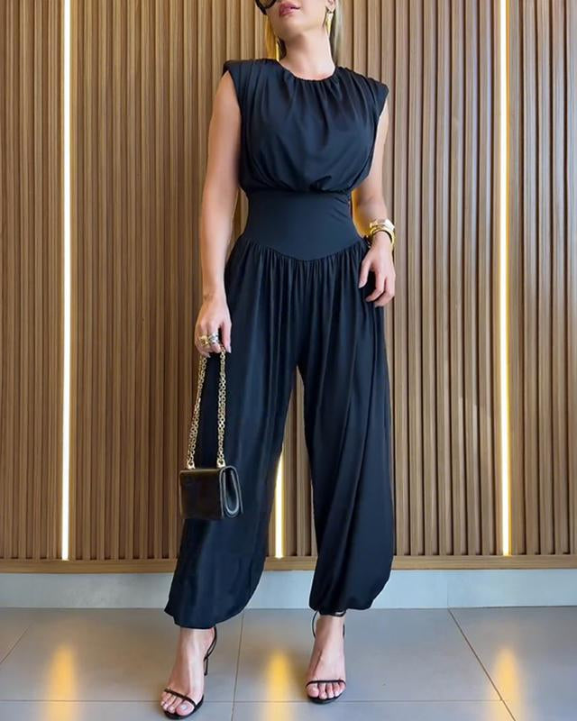 Modern women's sleeveless high waist romper with elegant balloon leg style.