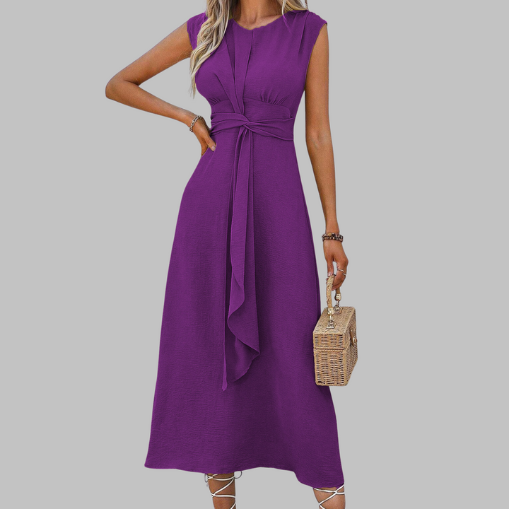 Stylish women's sleeveless round neck maxi dress, offering an elegant flowy silhouette for diverse occasions.