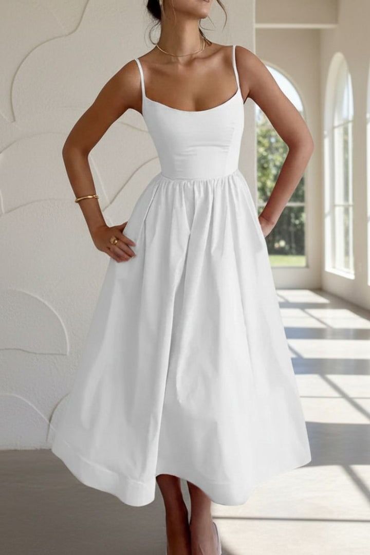 Chic women's fit and flare midi cocktail dress with a flattering scoop neck, ideal for evening events.