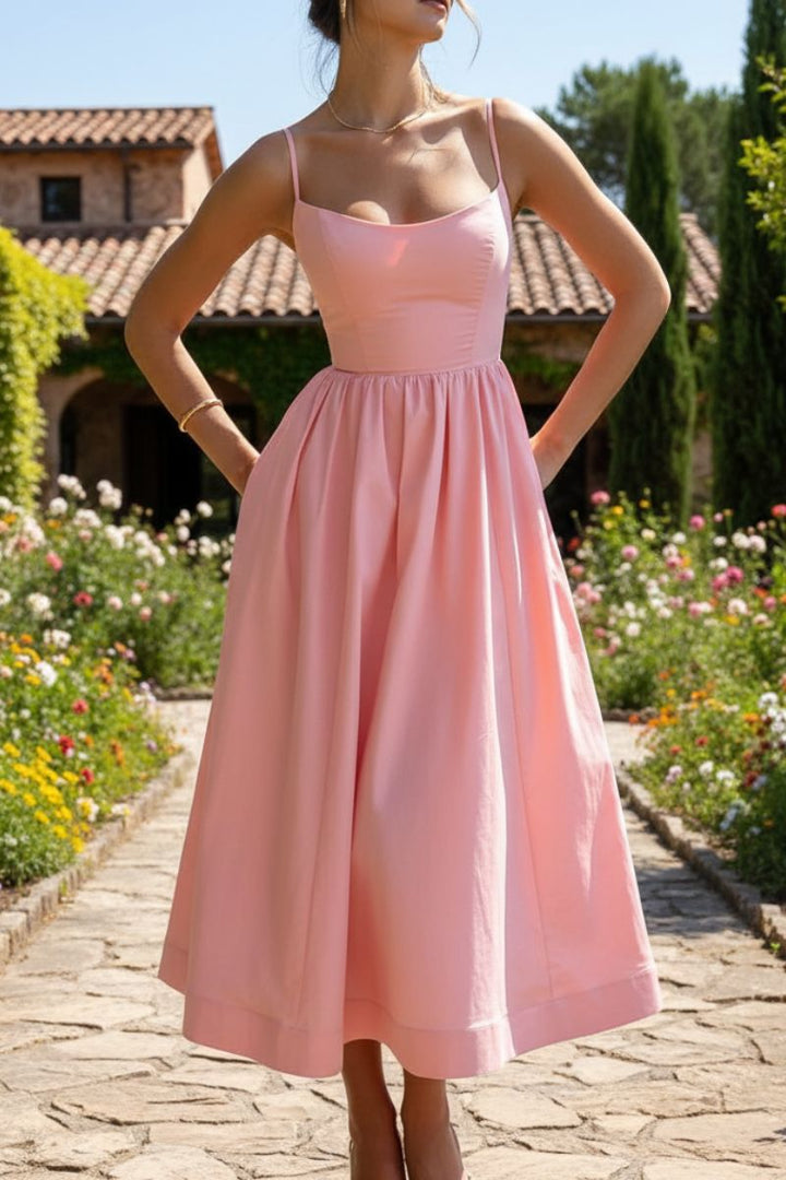 Modern women's evening dress: a sleeveless, scoop neck midi cocktail dress with a comfortable silhouette.