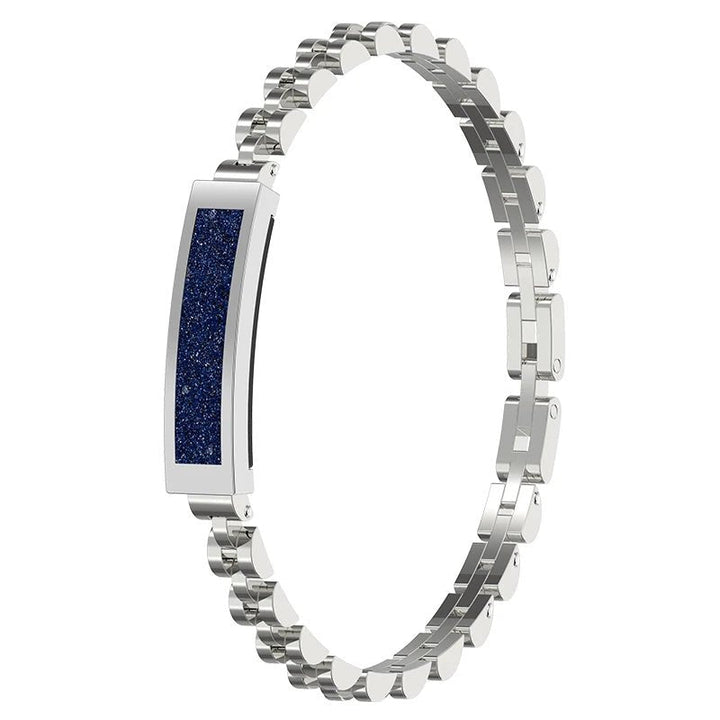 Women's elegant smart bracelet displaying time, steps, and heart rate, a stylish fitness accessory.